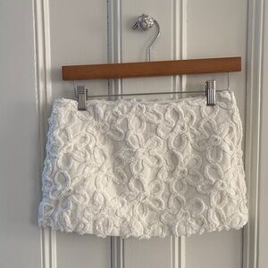 Textured white denim mini